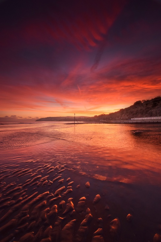 Sunset over Sandown Beach on the Isle of Wight.
