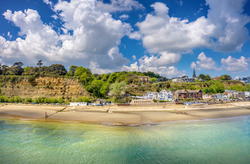 A warm summer view of Shanklin Beach on the Isle of Wight.